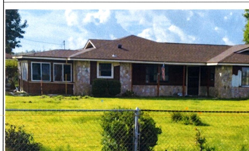 The house before renovation, July 2022